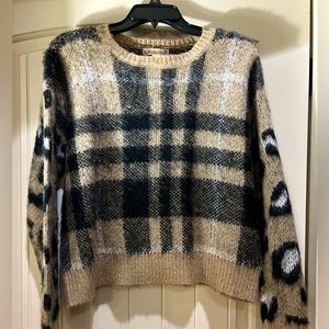 Tan and black sweater, size medium.